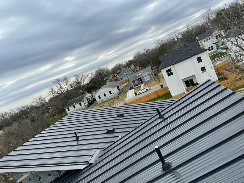 Standing seam metal roof panels with vents for Skylight Repair in Pflugerville